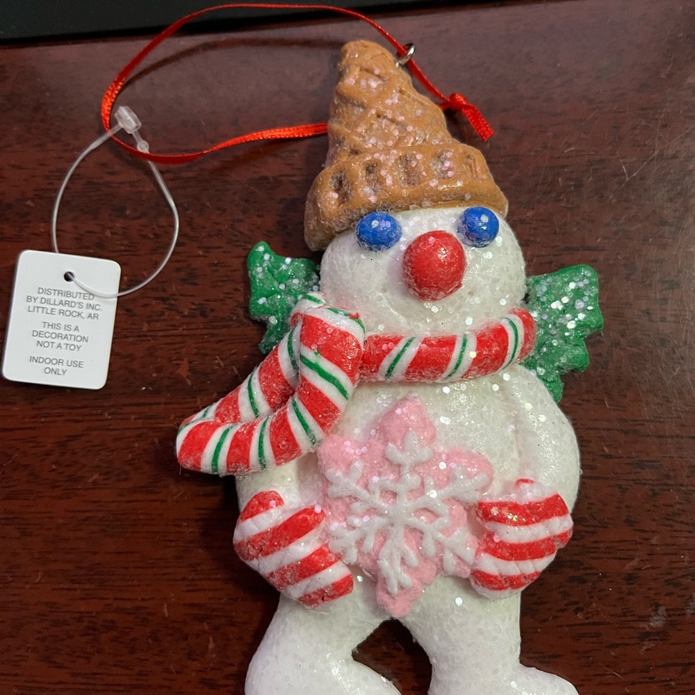 Mr Bingle 2025 Snowflake Ornament with Candy Cane Scarf & Red striped mittens.